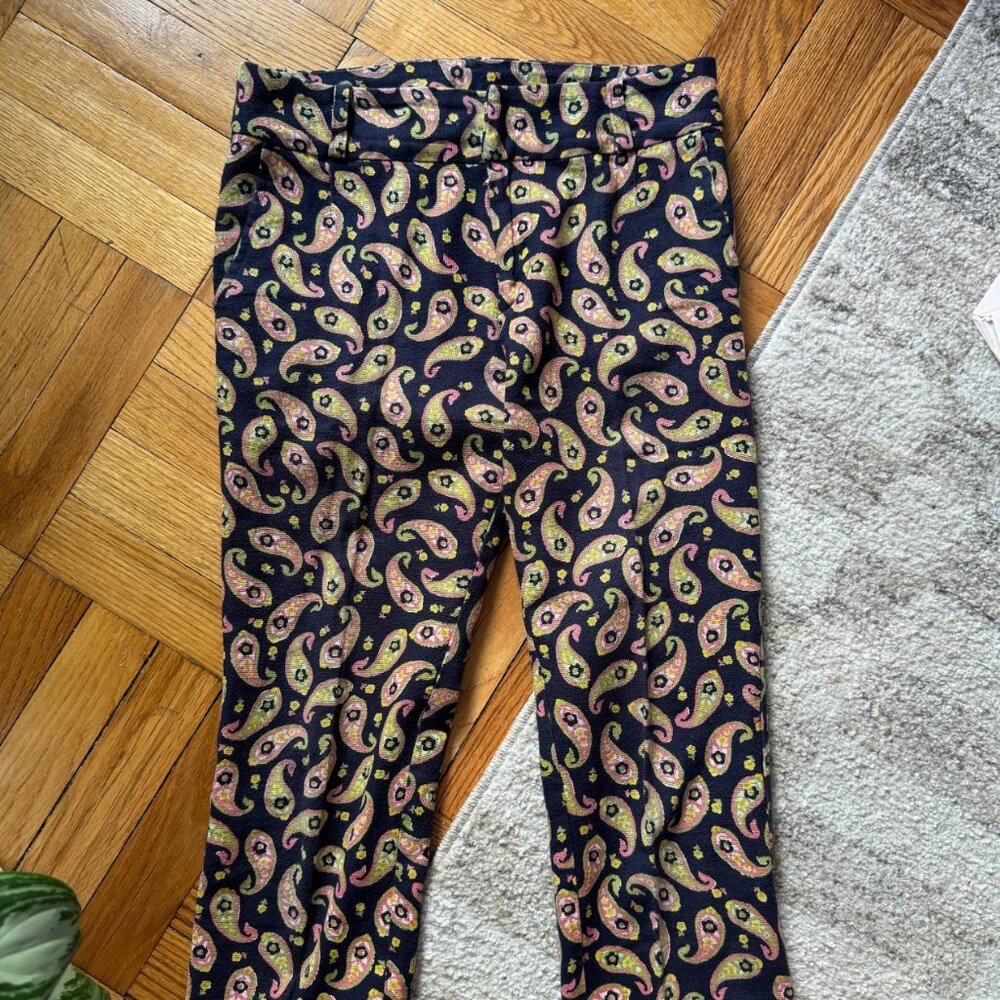 Comme des Garçons paisley print trousers in navy with pink, lime green, and yell